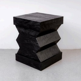 Small black sculptural wood stool or object